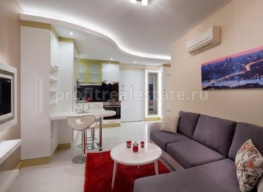 Комплекс с квартирами различных планировок недалеко от пляжа Клеопатры в центре Алании, Турция ID-0131 фото-6