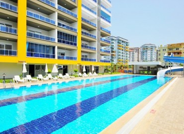 A new complex with hotel infrastructure from a reliable builder in Mahmutlar, Alanya, Turkey ID-0140 фото-1