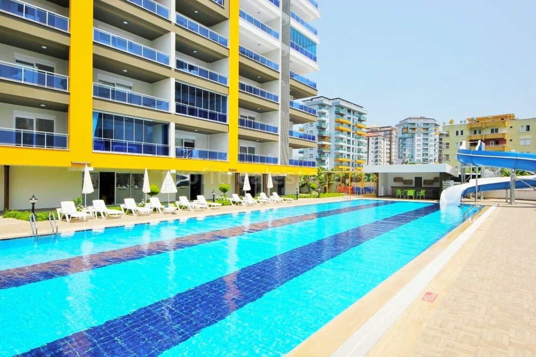A new complex with hotel infrastructure from a reliable builder in Mahmutlar, Alanya, Turkey ID-0140 фото-1