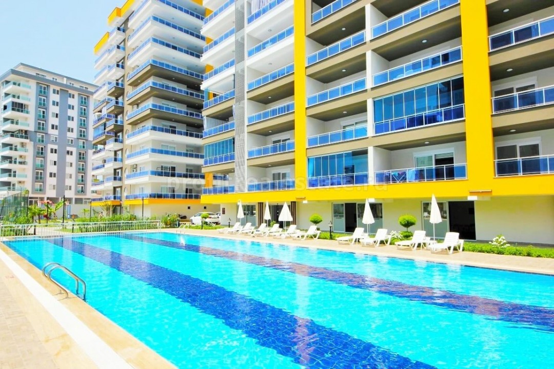 A new complex with hotel infrastructure from a reliable builder in Mahmutlar, Alanya, Turkey ID-0140 фото-2