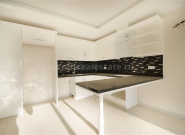 Новая двухкомнатная квартира, площадью 65 м2, в Махмутларе, Аланья ID-3643 фото-2