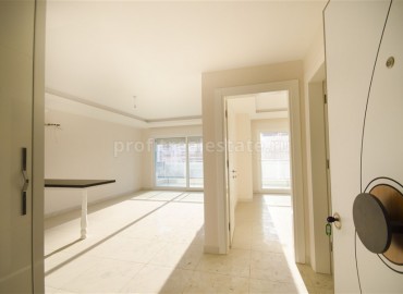 Новая двухкомнатная квартира, площадью 65 м2, в Махмутларе, Аланья ID-3643 фото-7