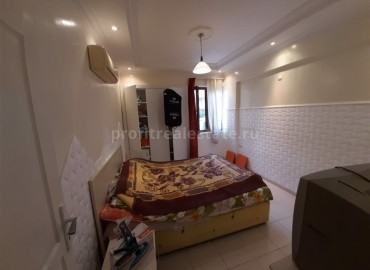 Бюджетная меблированная двухкомнатная квартира , 55м2 в Махмутларе ID-3650 фото-3