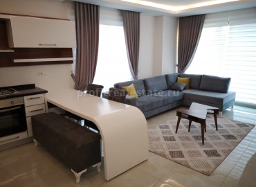 Аренда двухкомнатных апартаментов класса люкс в комплексе с инфраструктурой отеля в районе Махмутлар ID-3994 фото-1