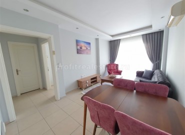 Двухкомнатная квартира в центре Махмутлара, Аланья, 65 м2 ID-3780 фото-4