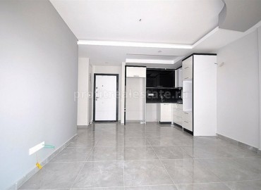 Квартира планировки 1+1 в Махмутларе в новом комплексе ID-3840 фото-6