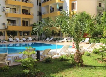 Недорогие двухкомнатные апартаменты в Махмутларе, Аланья, 55 м2 ID-3964 фото-1