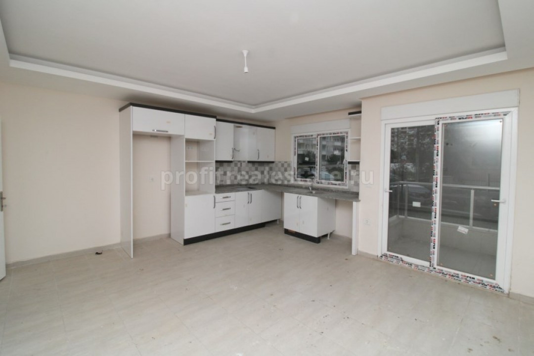 Продается недорогая двухкомнатная квартира 1+1, без мебели в районе Махмутлар, Алания ID-4057 фото-2