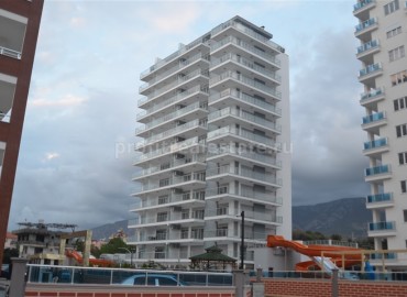Новая квартира планировки 1+1, площадью 76 кв м, в новом комплексе в центре Махмулара, Алания ID-4080 фото-1