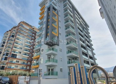 Новая квартира с одной спальней в комплексе 2018 года постройки в курортном районе Махмутлар ID-4238 фото-1