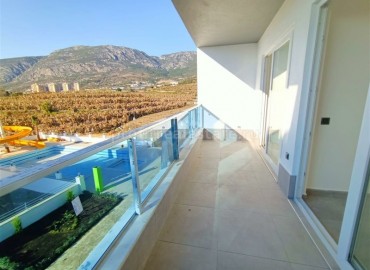 New one-bedroom apartment in the picturesque area of Mahmutlar, Alanya, 65 m2 ID-4302 фото-2