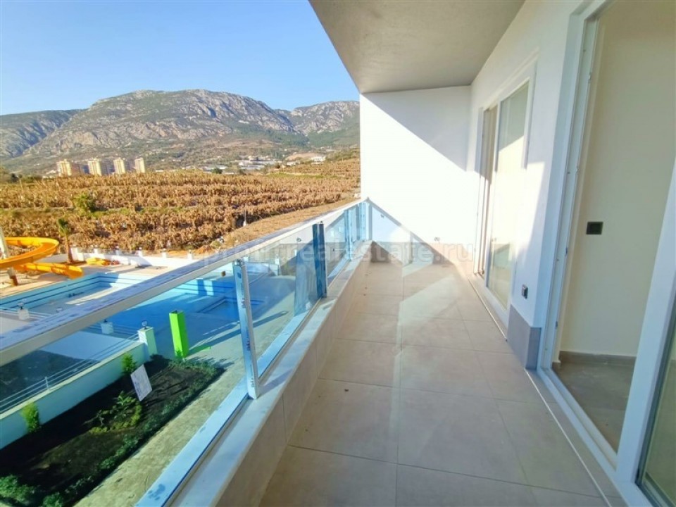 New one-bedroom apartment in the picturesque area of Mahmutlar, Alanya, 65 m2 ID-4302 фото-2