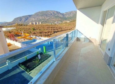 New one-bedroom apartment in the picturesque area of Mahmutlar, Alanya, 65 m2 ID-4302 фото-9
