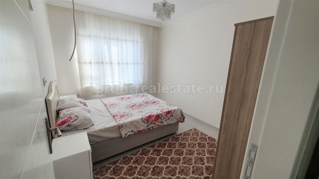 Inexpensive apartment 1 + 1 with furniture in Mahmutlar, new house, 500 meters to the beach ID-4310 фото-2