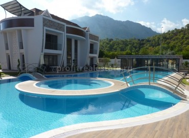 A chic complex surrounded by pine forests and orange groves in Kemer, Turkey 370x270 }}