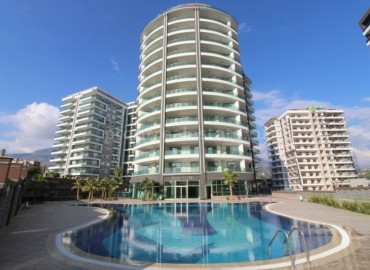 Новые двухкомнатные апартаменты, готовые к заселению, в комплексе с богатой инфраструктурой, Махмутлар, Аланья, 75 м2 ID-4356 фото-1