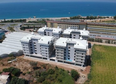 Новая двухкомнатная квартира, всего в 250 метрах от моря, Каргыджак, Аланья ID-4432 фото-1