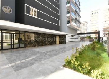 Новая трехкомнатная квартира, готовая к заселению, в 150 метрах от центра Махмутлара, Аланья ID-4536 фото-26