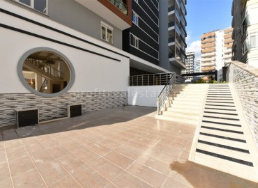 Новая трехкомнатная квартира, готовая к заселению, в 150 метрах от центра Махмутлара, Аланья ID-4536 фото-27