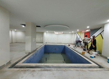 Новая трехкомнатная квартира, готовая к заселению, в 150 метрах от центра Махмутлара, Аланья ID-4536 фото-34
