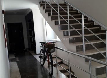 Недорогая двухкомнатная квартира, готовая к заселению, в 100 метрах от центра Махмутлара, Аланья ID-4546 фото-14}}