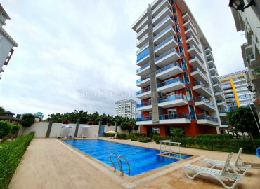 Двухкомнатная квартира в Алании на высоком девятом этаже, открытый вид на горы ID-4618 фото-1