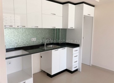 Новая двухкомнатная квартира по выгодной цене, Махмутлар, Аланья, 65 м2 ID-4640 фото-4