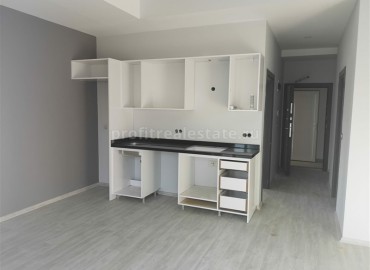 Новая двухкомнатная квартира, в жилом комплексе, построенном  в 2020 году, в Махмутларе, Аланья ID-4651 фото-3