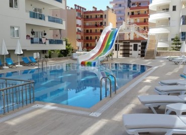 Просторные двухкомнатные апартаменты, готовые к заселению, в Махмутларе, Аланья, 75 м2 ID-4667 фото-1