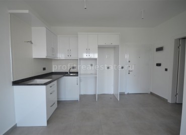 Новые двухкомнатные апартаменты в чудесном районе Махмутлара, Аланья, 65 м2 ID-4703 фото-5