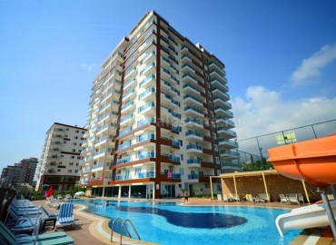 Уютная двухкомнатная квартира, готовая к заселению, в комплексе с богатой инфраструктурой, Махмутлар, Аланья, 75 м2 ID-4730 фото-1