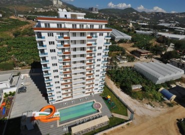 Двухкомнатные апартаменты, с мебелью и техникой, в комплексе с обширной инфраструктурой, Махмутлар, Аланья, 65 м2 ID-4735 фото-1